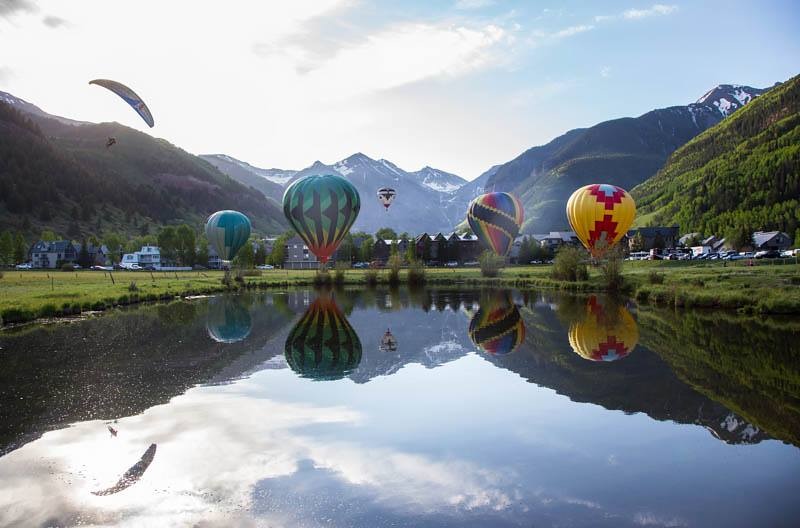 Balloons reflecting in water in Telluride
