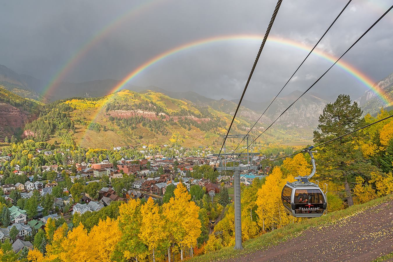 Gondola with a double rainbow